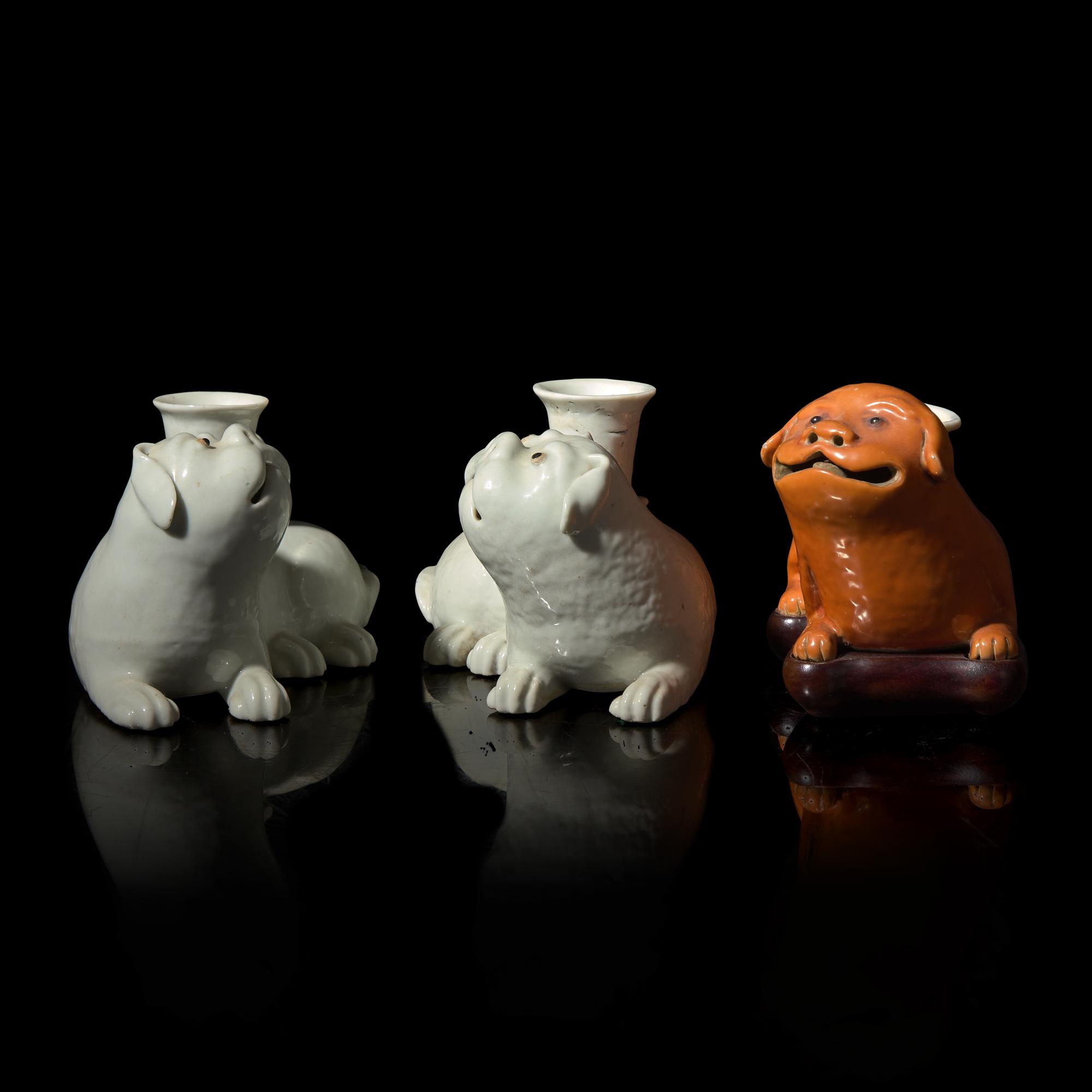 Three Chinese Export Porcelain Dog Candleholders, 19th Century 清晚期 外銷臥犬燭臺三件