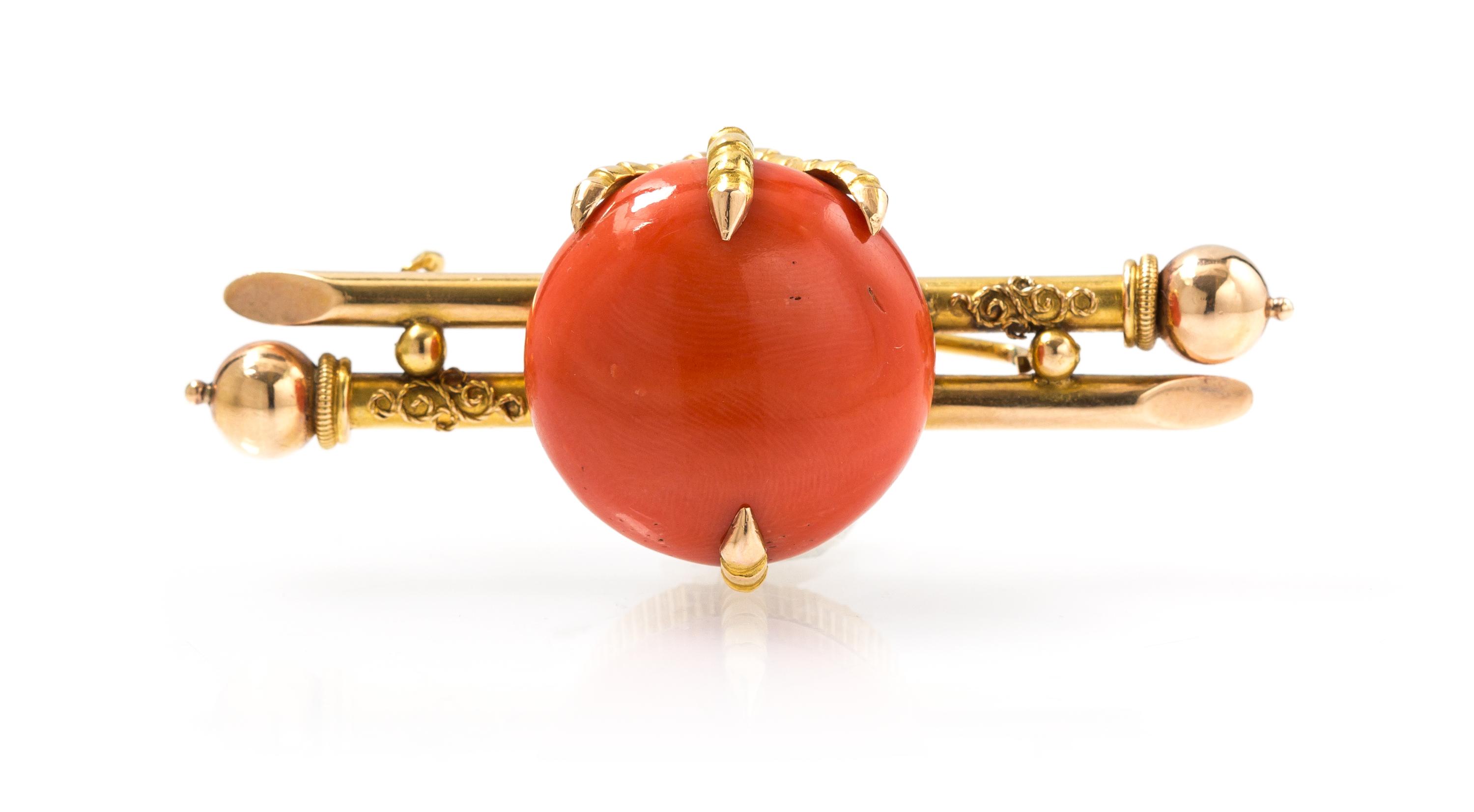 An Antique 18 Karat Yellow Gold and Coral Brooch, 9.80 dwts.