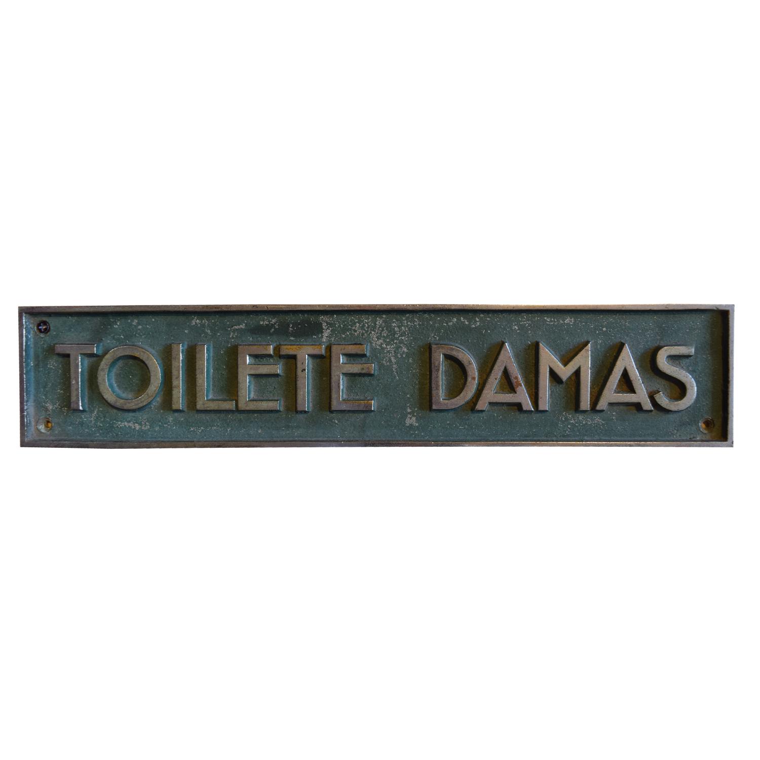 A Pair of Cast Brass and Chrome Toilete Signs 15.5" W x 3" H — Argentina, Early 20th Century