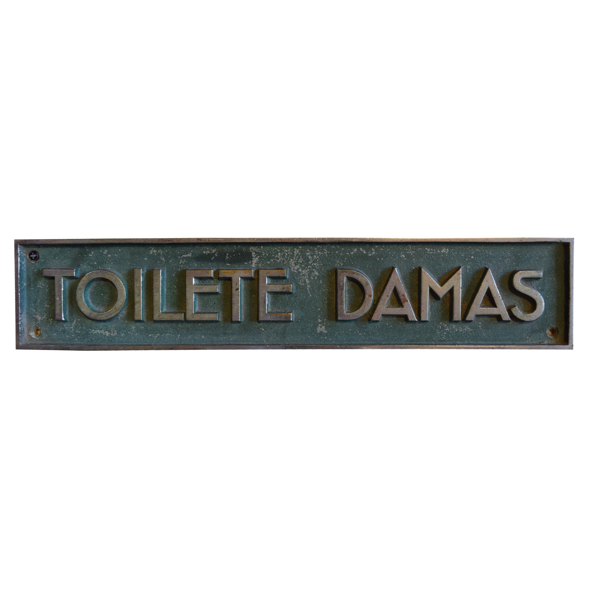 A Pair of Cast Brass and Chrome Toilete Signs 15.5" W x 3" H — Argentina, Early 20th Century
