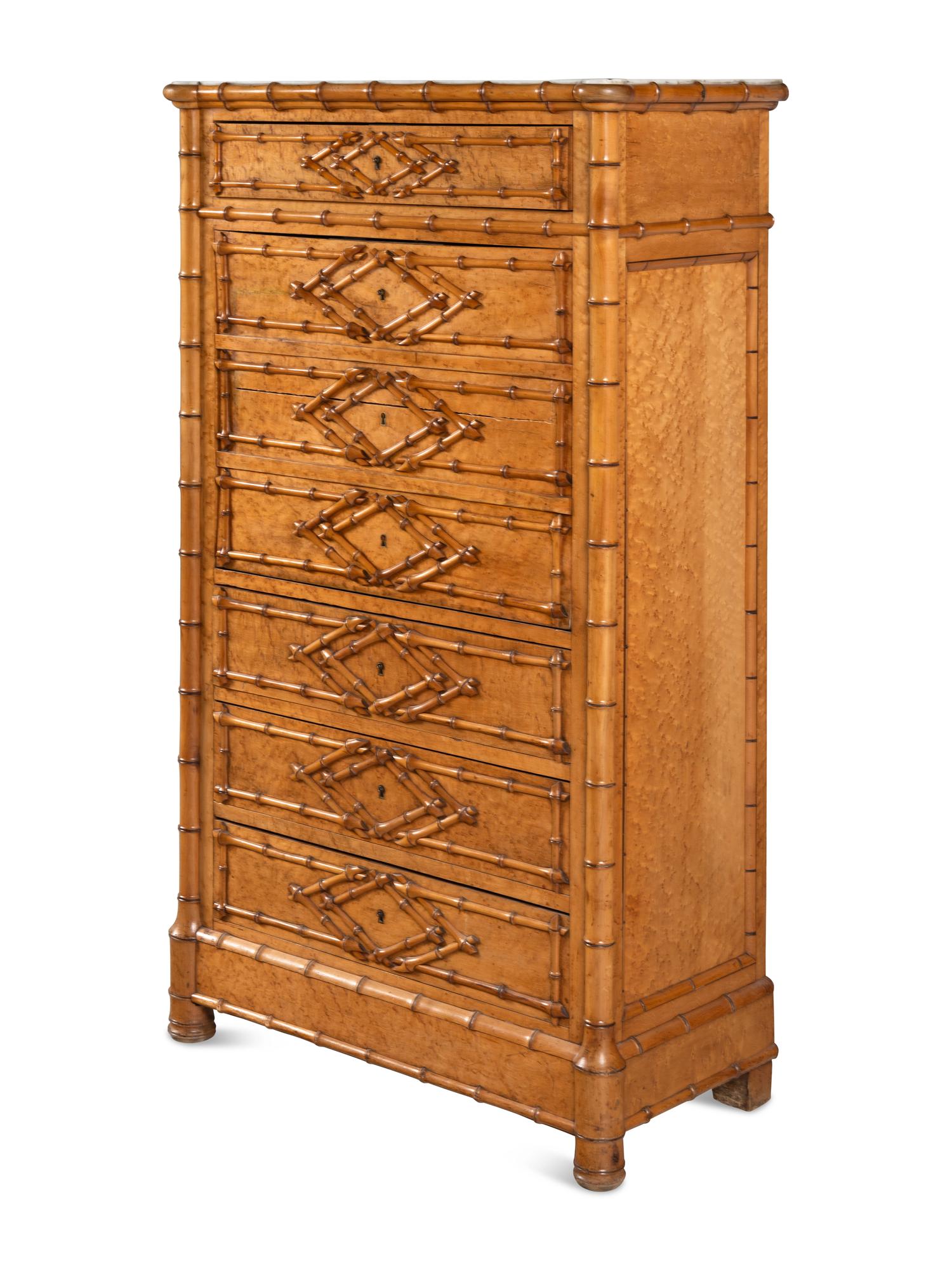 A Victorian Faux Bamboo-Carved Birdseye Maple Bureau Chest