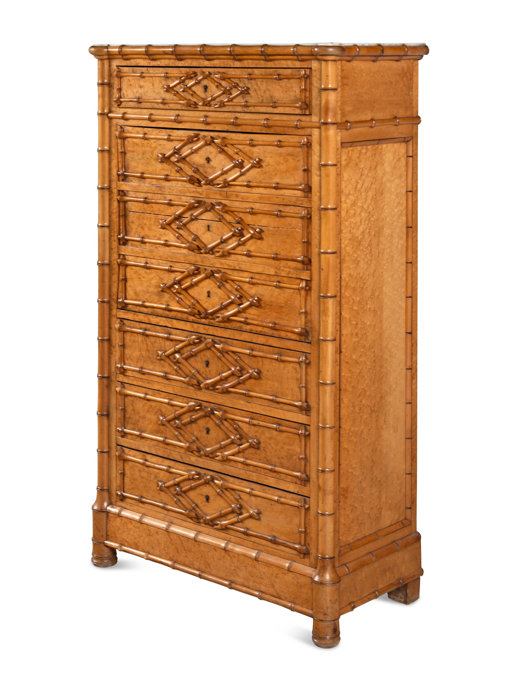 A Victorian Faux Bamboo-Carved Birdseye Maple Bureau Chest