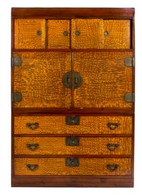 A Japanese Elm and Fruitwood Cabinet Height 65 1/4 x width 45 1/2 x depth 19 1/2 inches.