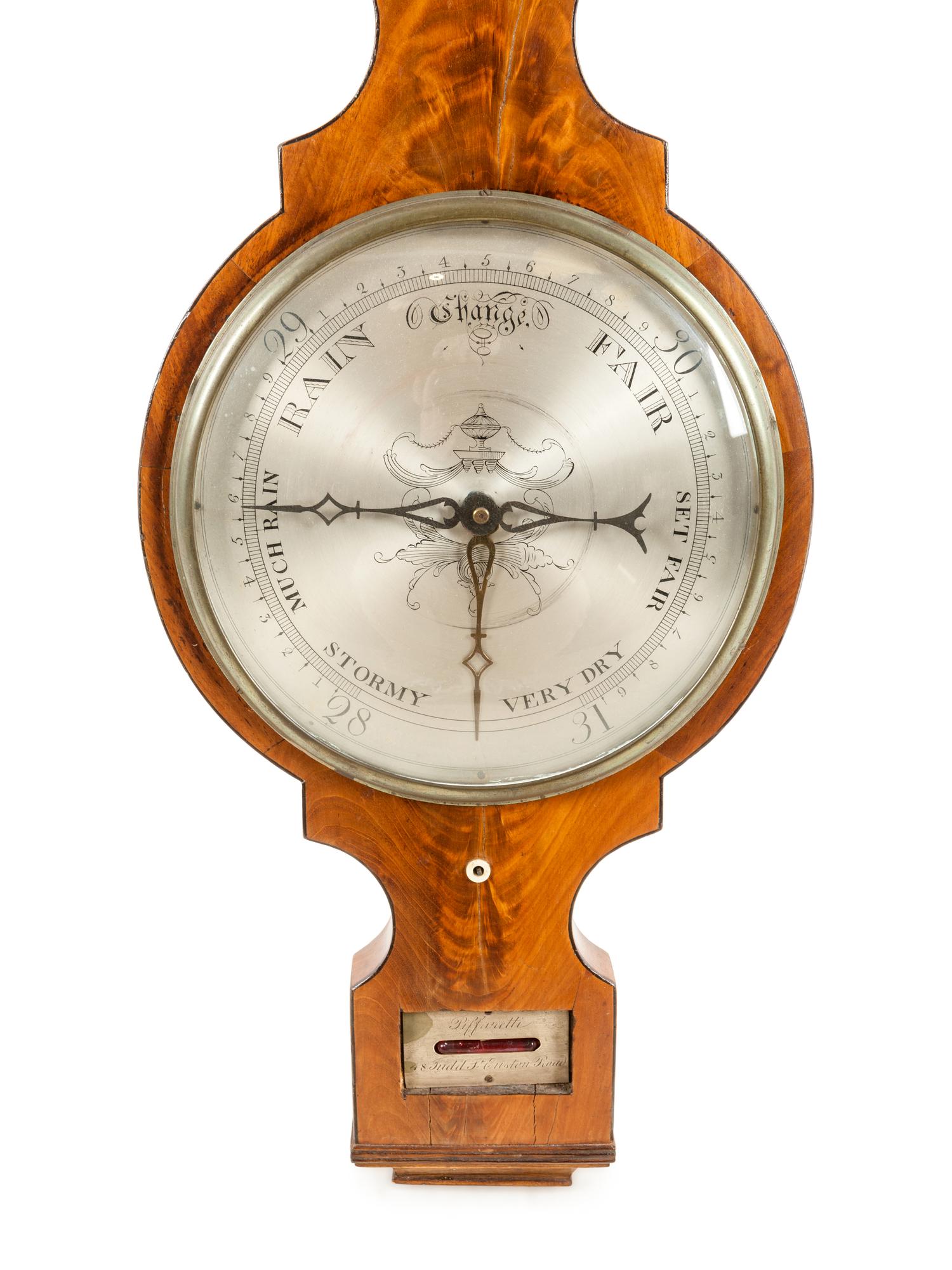 A Regency Mahogany Wheel Barometer