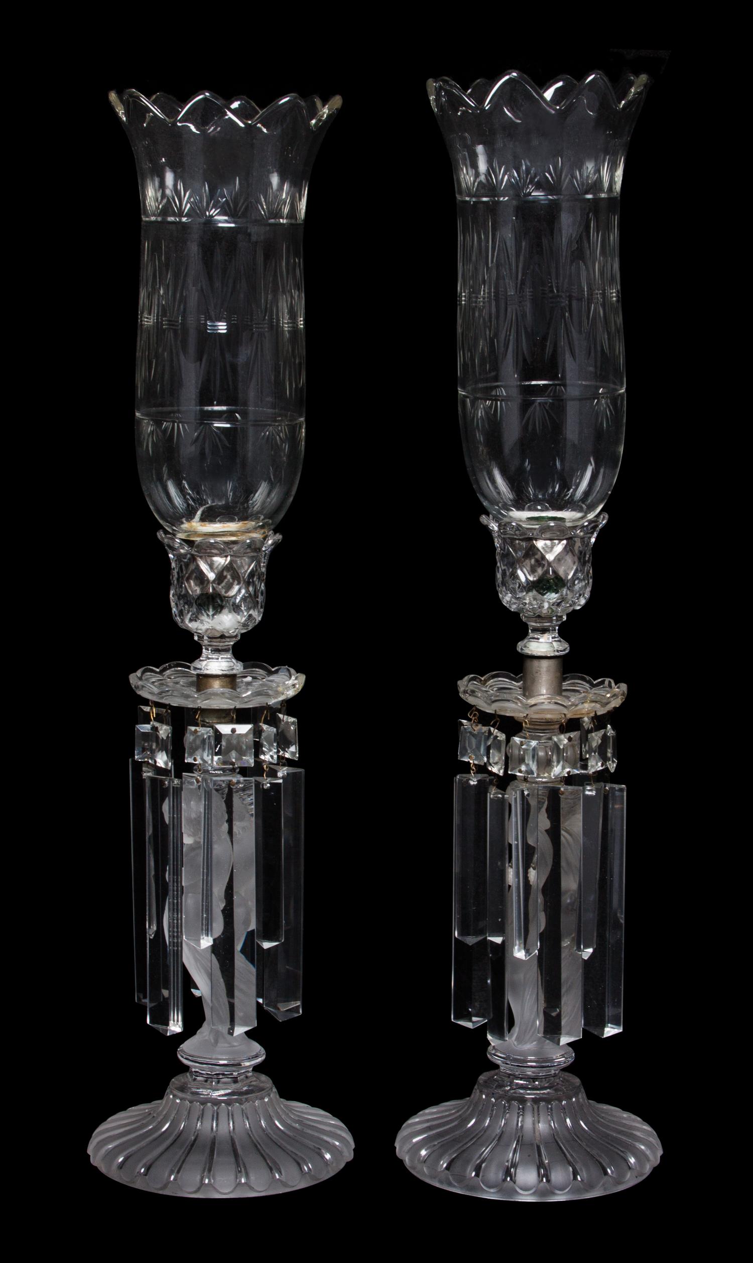 A Pair of Baccarat Frosted and Clear Glass Figural Candlesticks Height 24 inches.