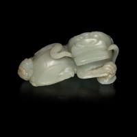 A Large Pale Celadon Jade Figure of a Fu Lion and Cub