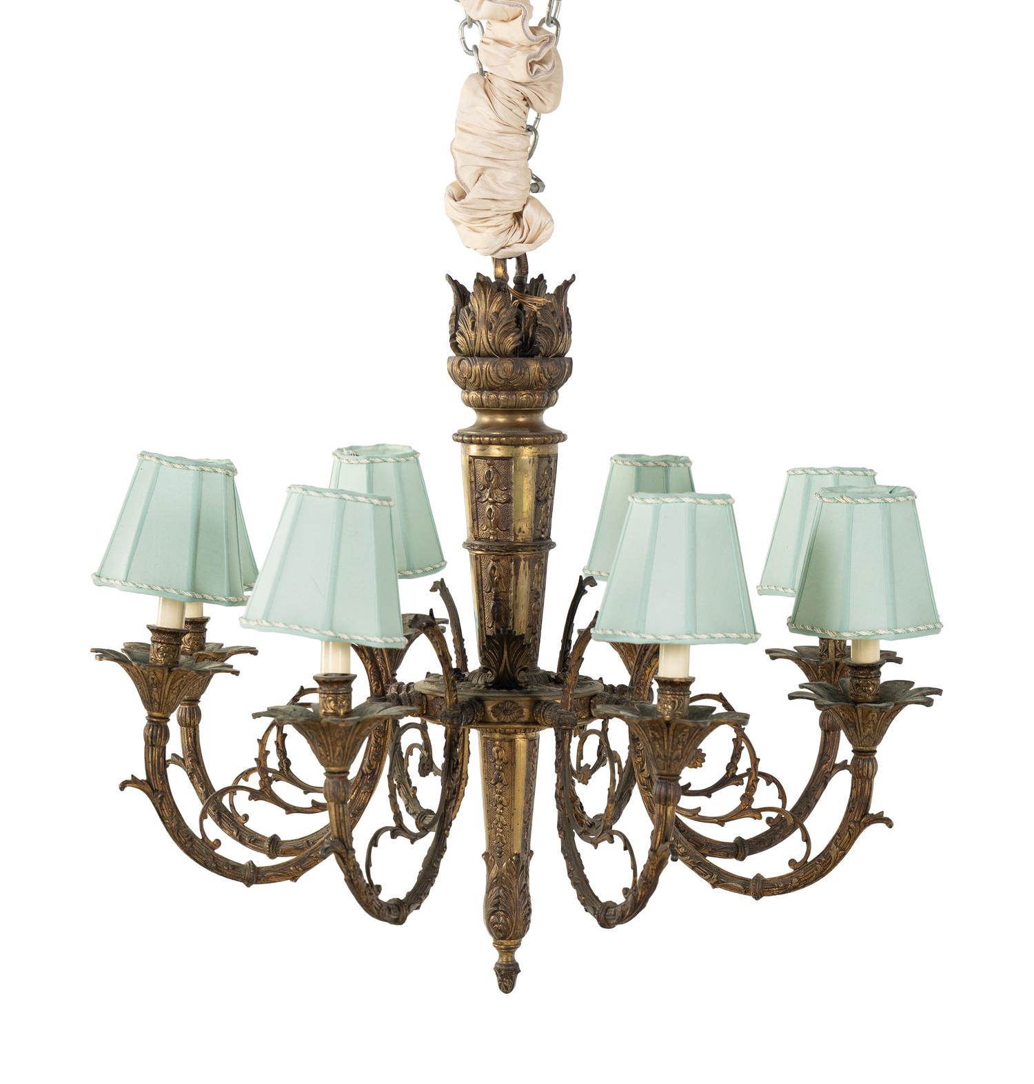 A Continental Bronze Eight-Light Chandelier