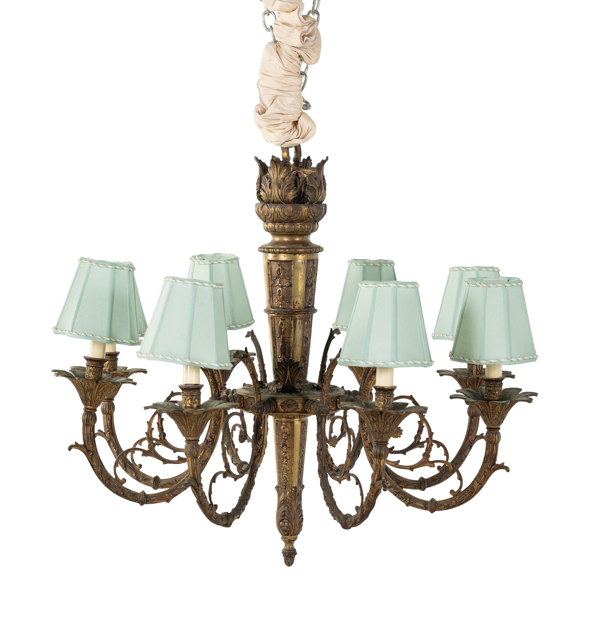 A Continental Bronze Eight-Light Chandelier