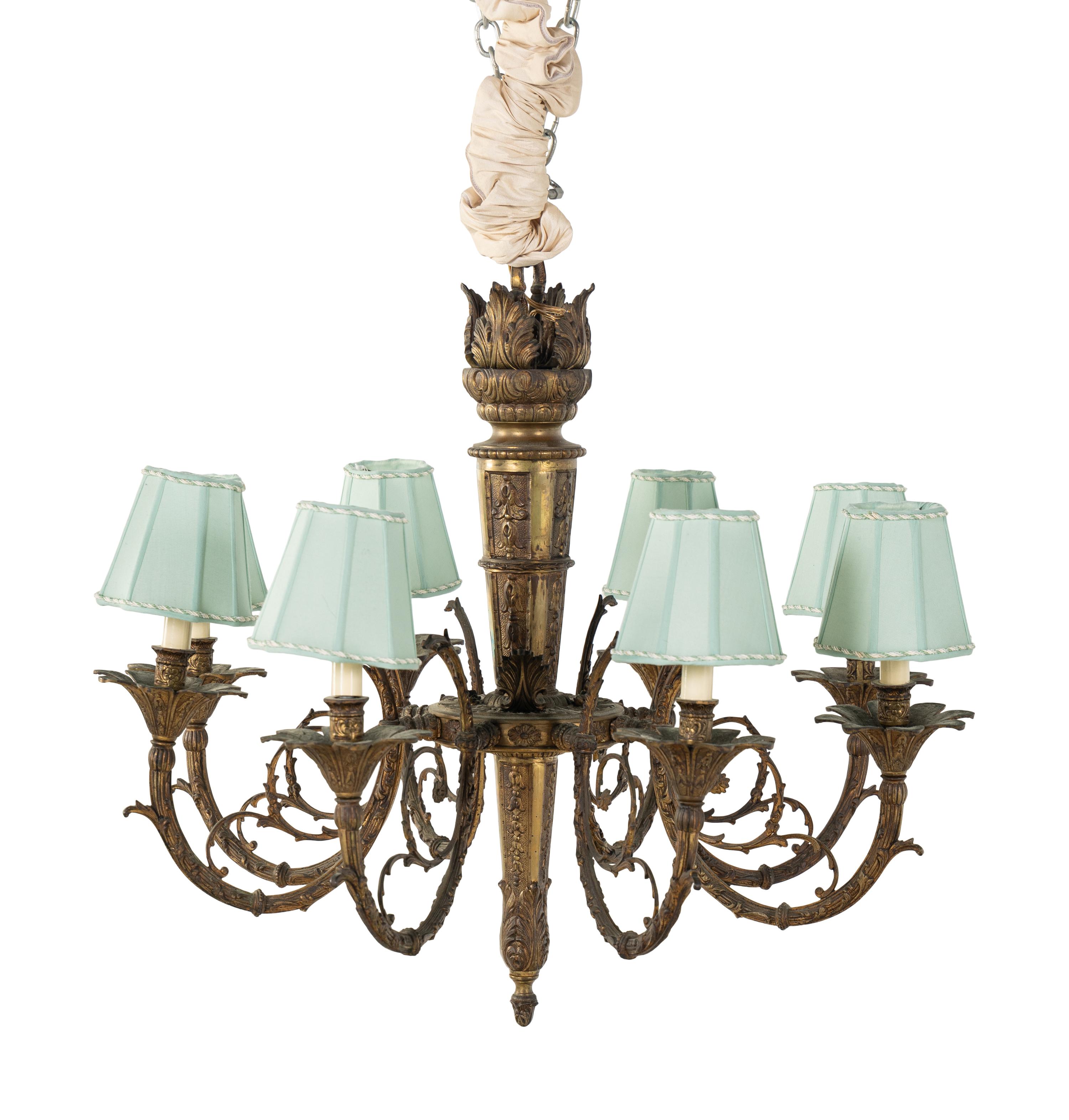 A Continental Bronze Eight-Light Chandelier