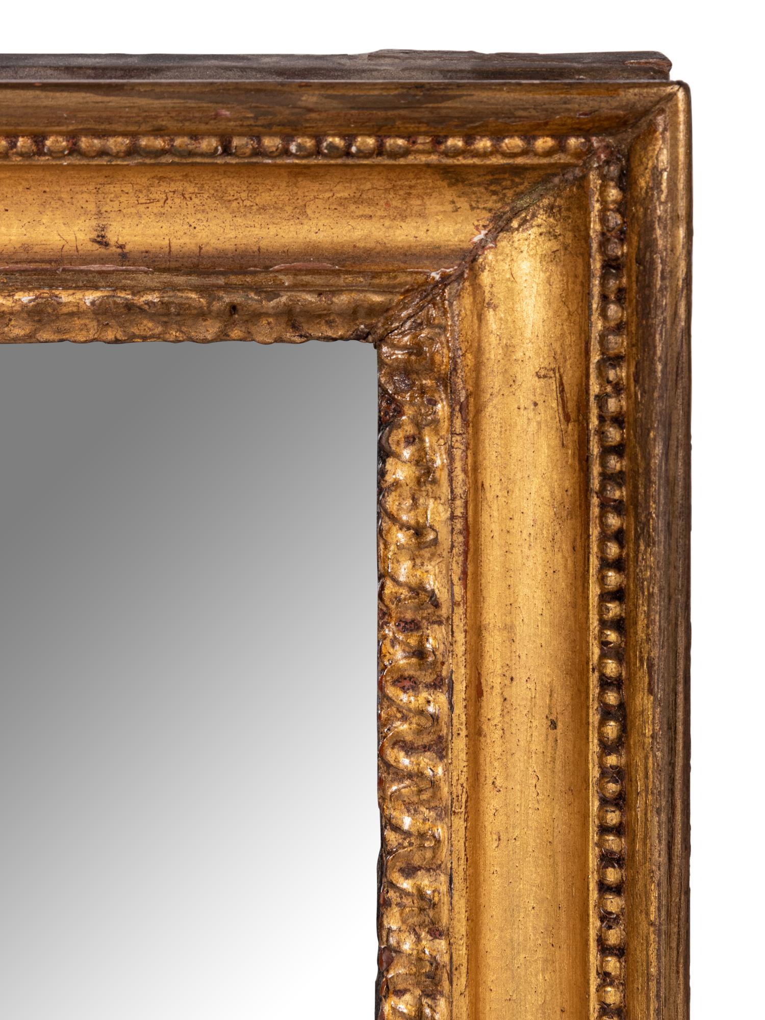 A George III Style Giltwood Mirror with an Eagle Finial
