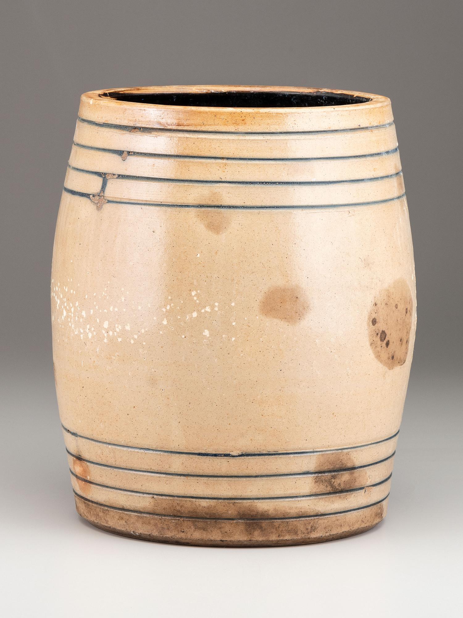 A Maxstun, Ottman & Co. Cobalt Decorated Six-Gallon Stoneware Cooler