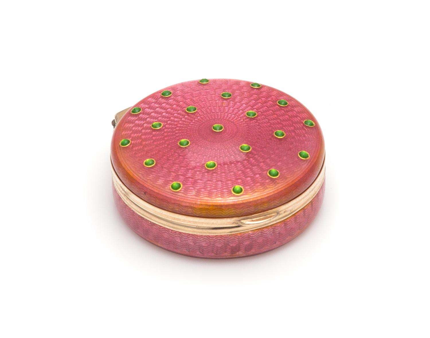 A Russian Silver and Guilloche Enameled Pill Box, Maker's Mark EK, Late 19th/Early 20th Century, having a pink guilloche enameled groun