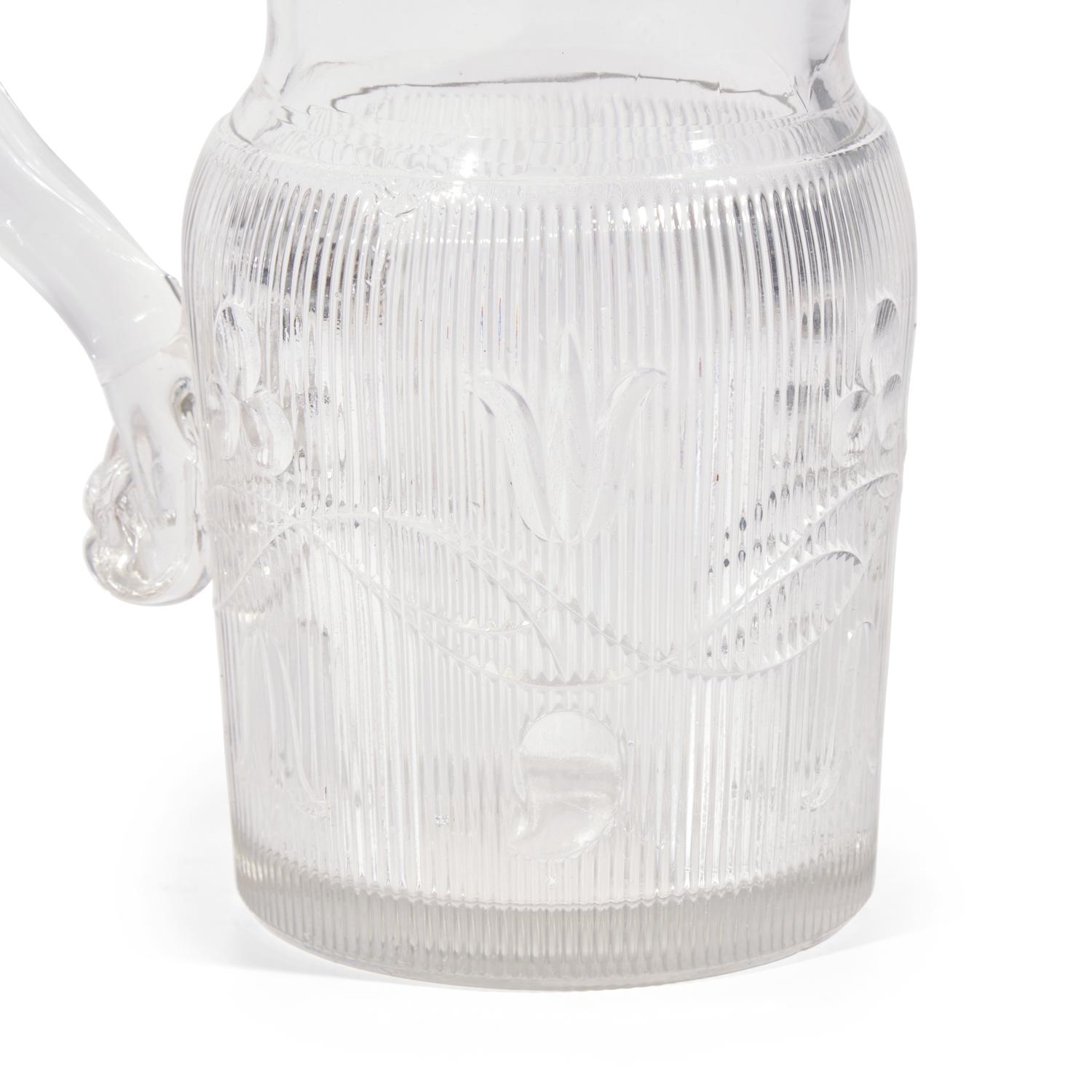 Two Pressed and Molded Flint Glass Pitchers