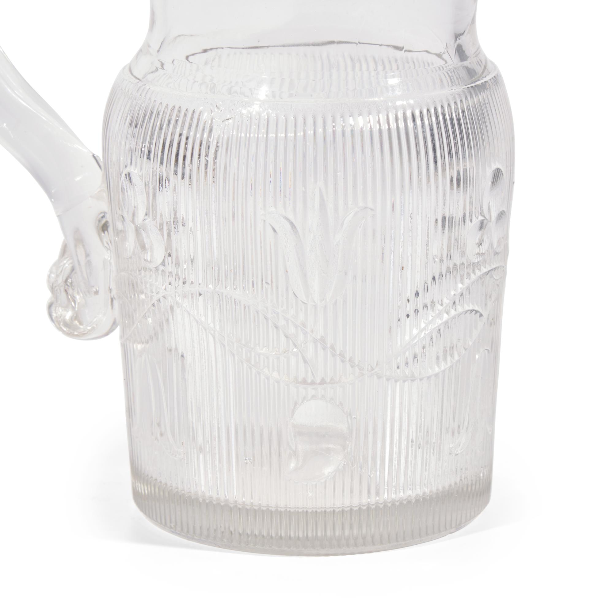 Two Pressed and Molded Flint Glass Pitchers