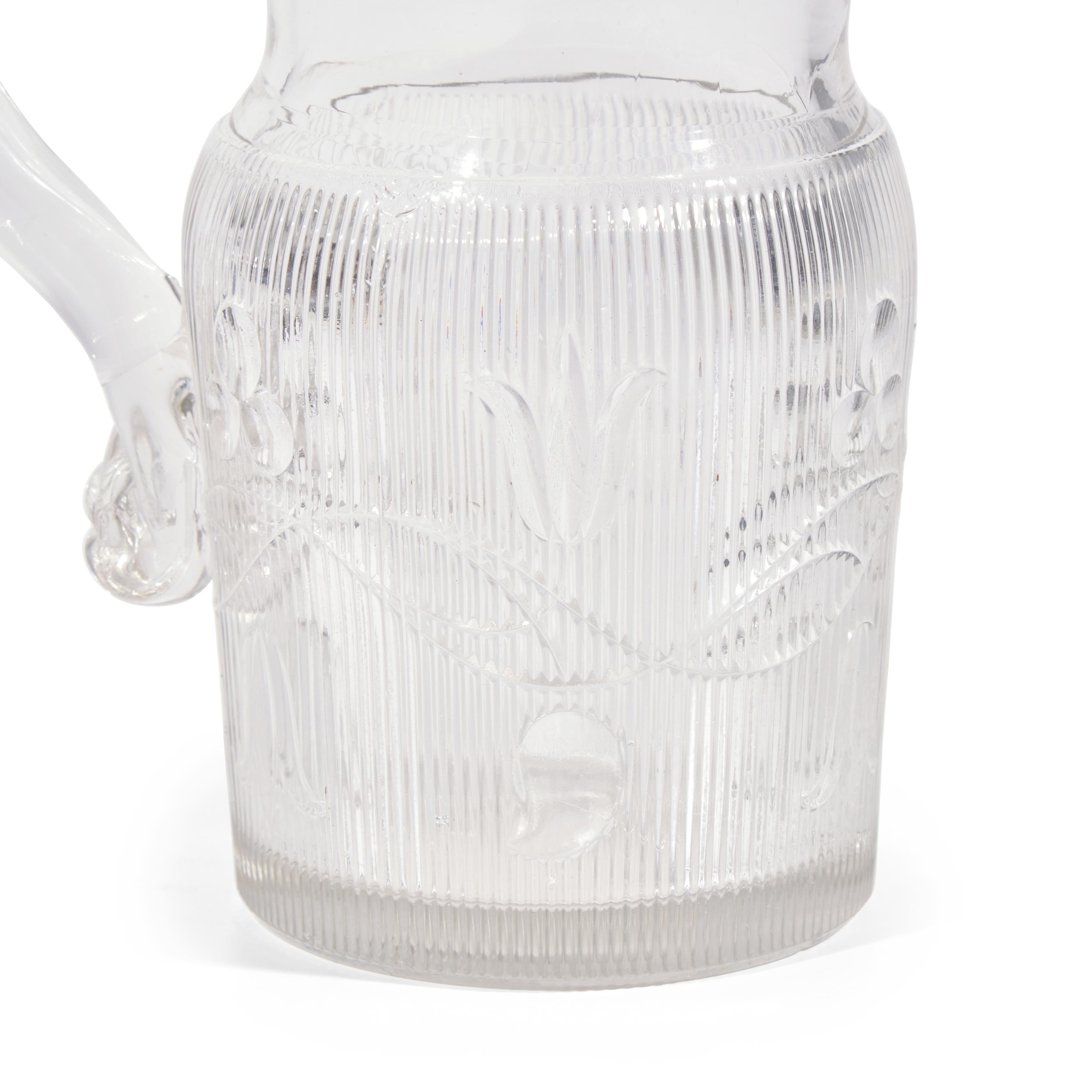 Two Pressed and Molded Flint Glass Pitchers