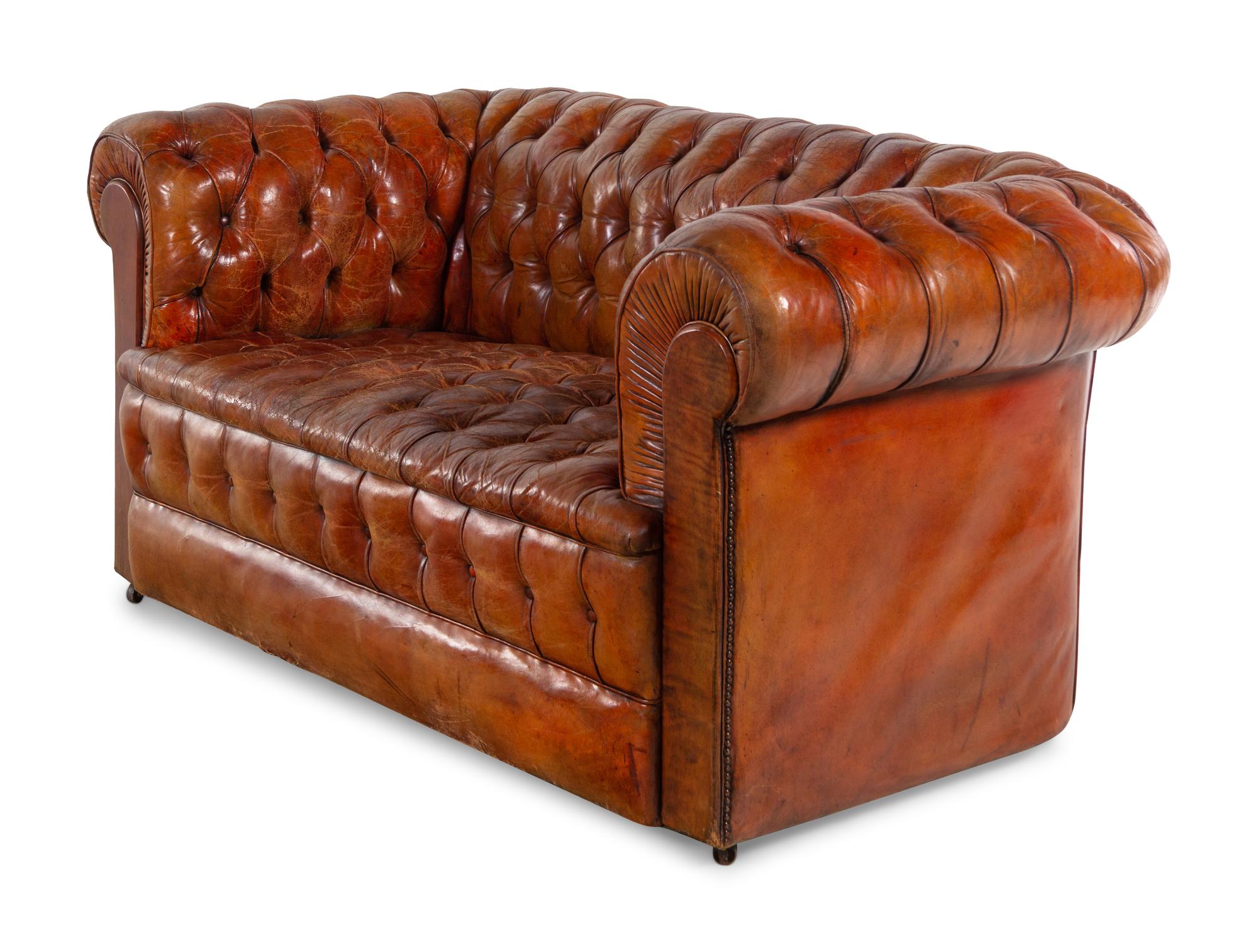 An English Leather Upholstered Chesterfield Sofa