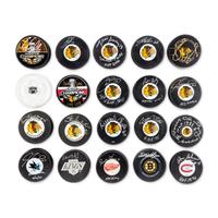 A Collection of Signed Autograph Hockey Pucks Including Wayne Gretzky