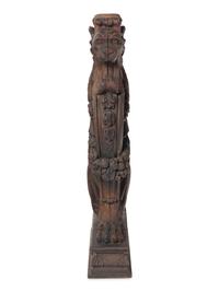 A Massive Carved Oak Griffin Newel Post