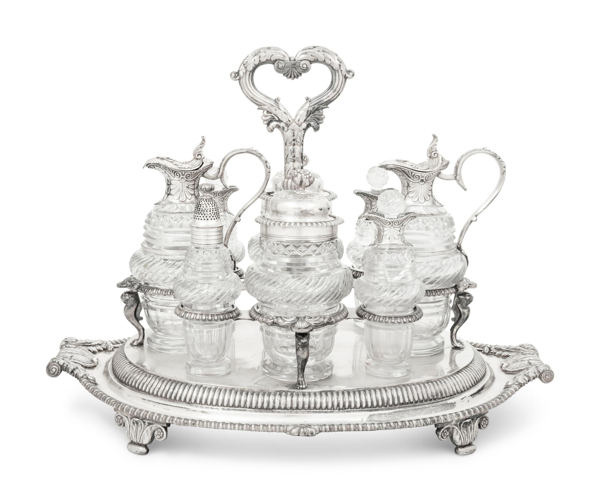 A Paul Storr Silver and Cut Glass Cruet Set