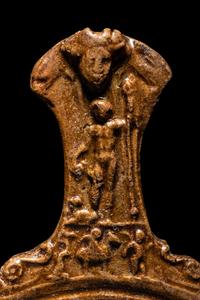 A Hellenistic Molded Glazed Pottery Handle