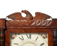 A Classical Carved Mahogany, Stencil-Decorated and Églomisé Shelf Clock