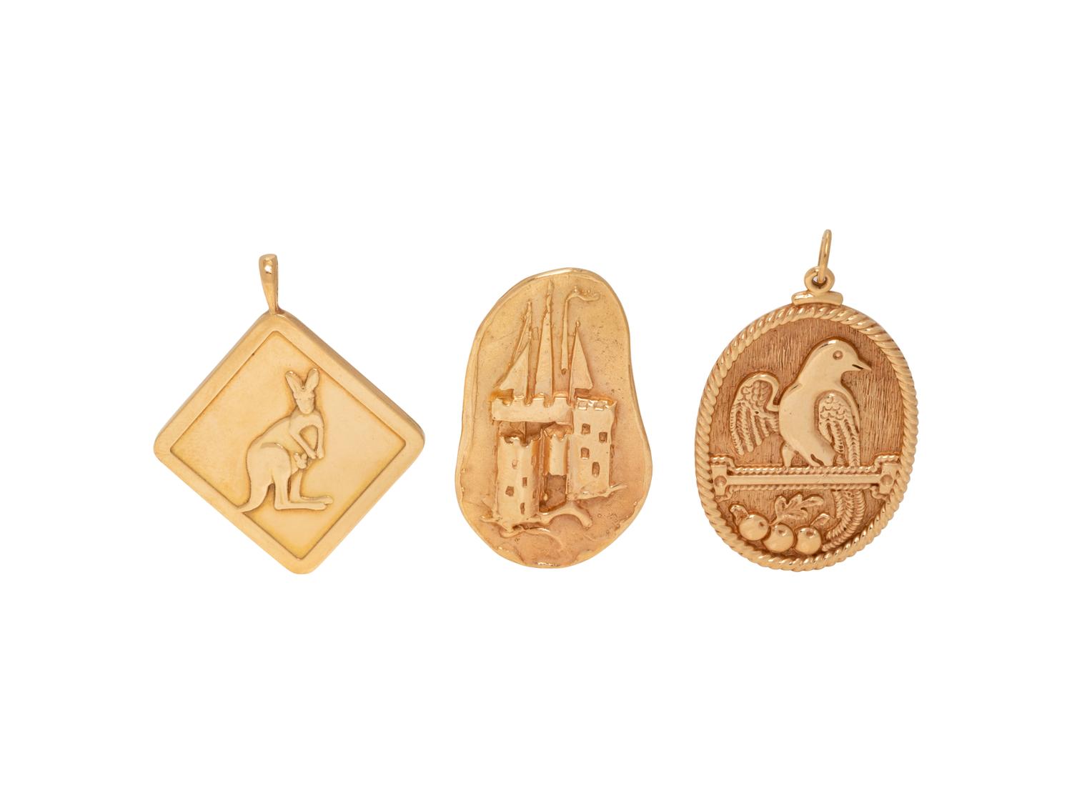 COLLECTION OF YELLOW GOLD CHARMS
