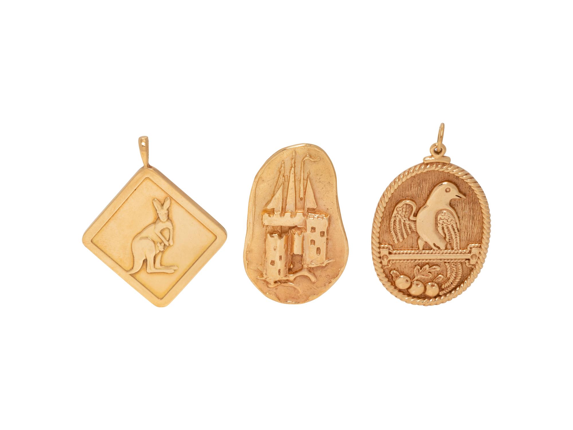 COLLECTION OF YELLOW GOLD CHARMS