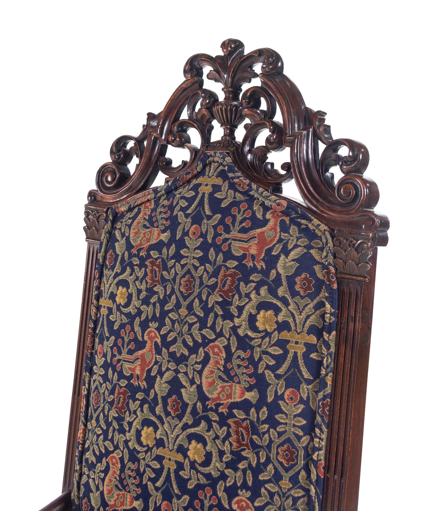 An Italian Baroque Style Carved Walnut Armchair