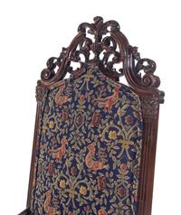An Italian Baroque Style Carved Walnut Armchair