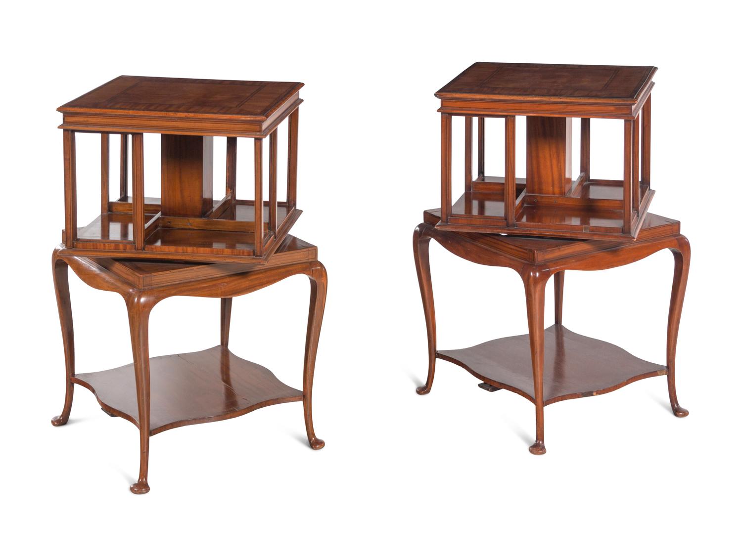 A Pair of Edwardian Satinwood and Mahogany Revolving Bookcases