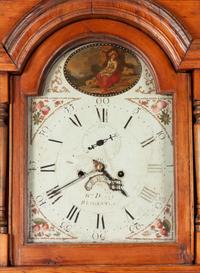 A George III Brass Mounted and Polychrome Decorated Tall Case Clock