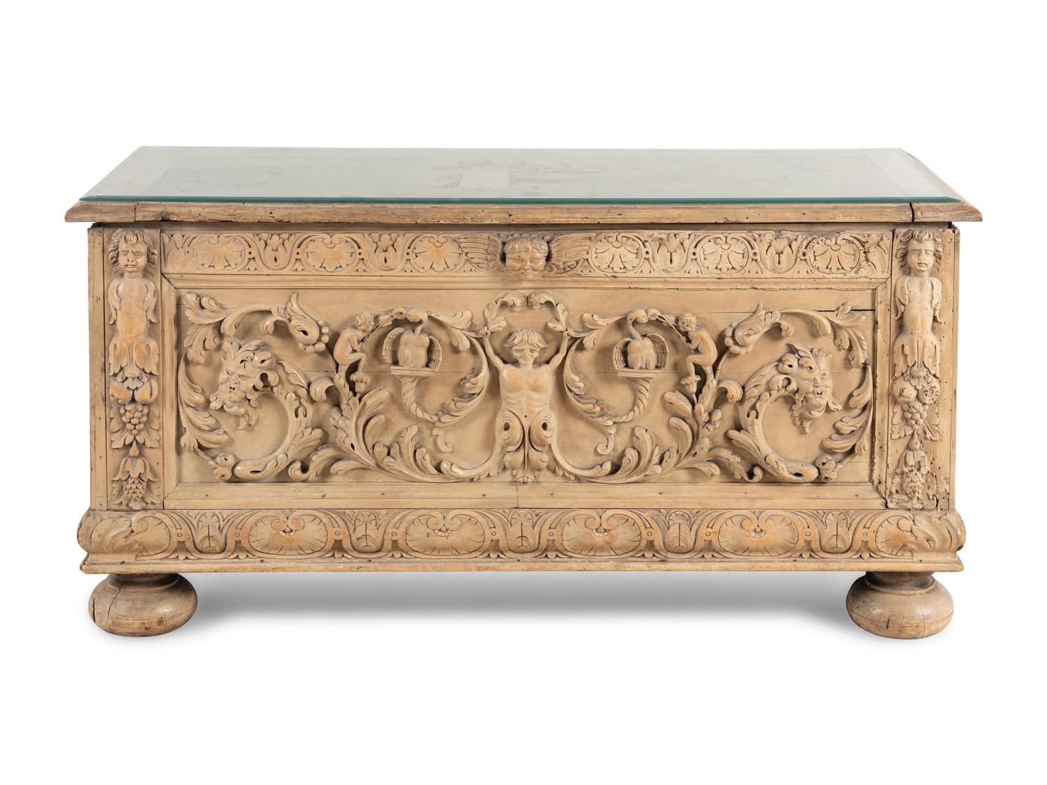 A Continental Carved Oak Cassone