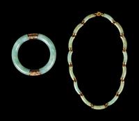 A Chinese Green Jadeite Necklace and Bracelet
