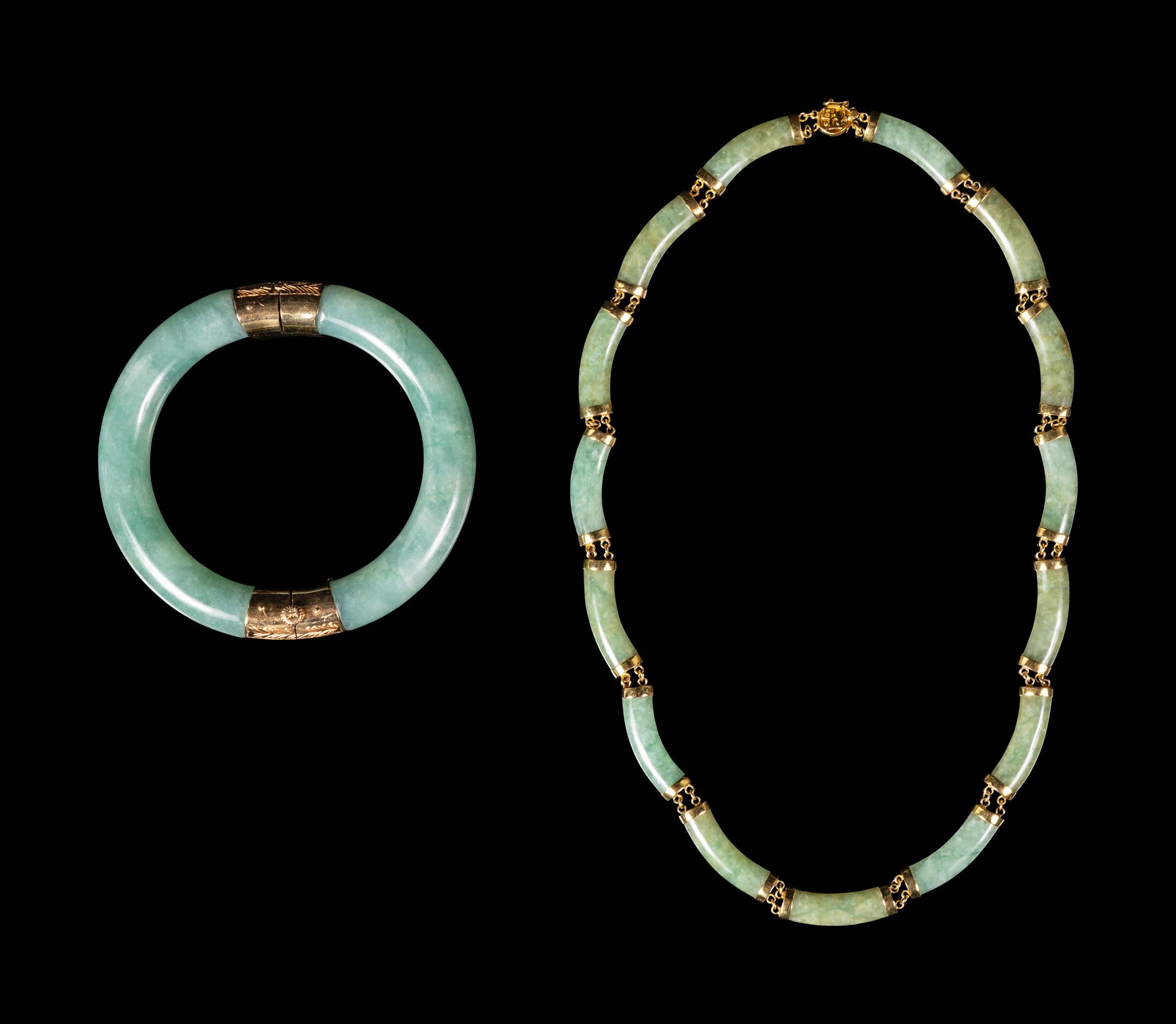 A Chinese Green Jadeite Necklace and Bracelet