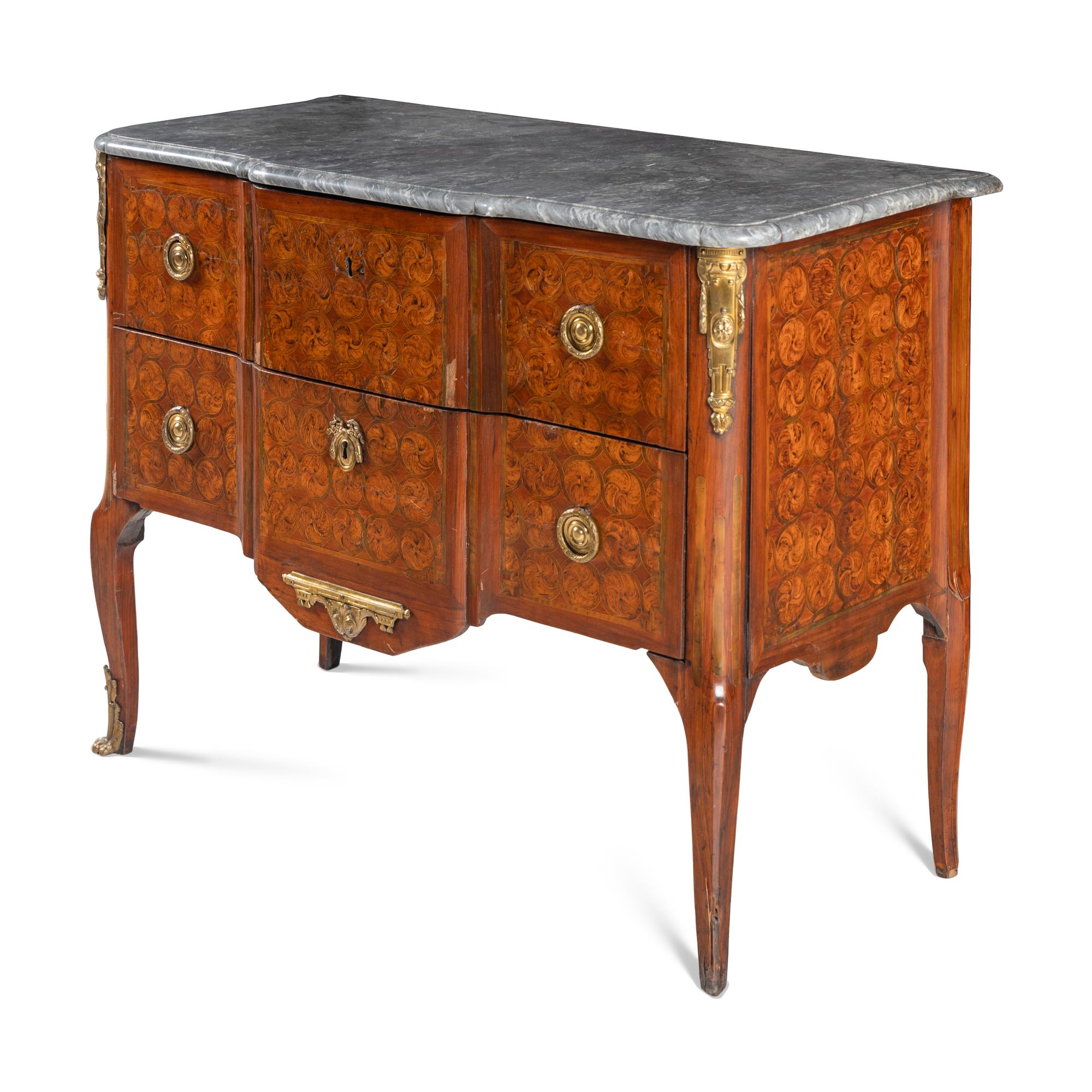 A Louis XV/XVI Transitional Gilt Bronze Mounted Marquetry Tulipwood and Amaranth Commode