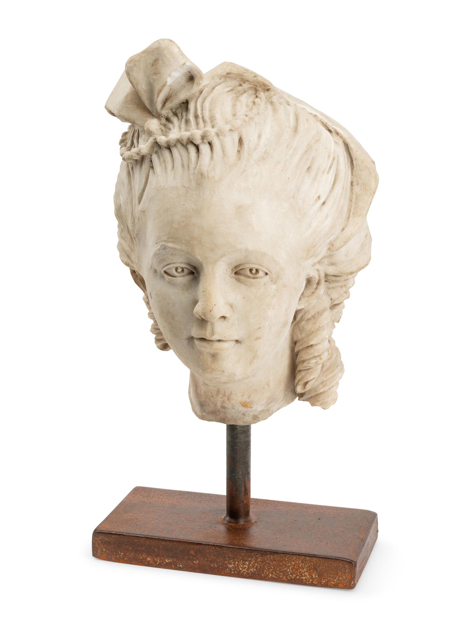 An Italian Marble Head of a Lady on an Iron Base