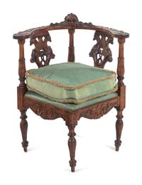 An English Carved Walnut Corner Chair