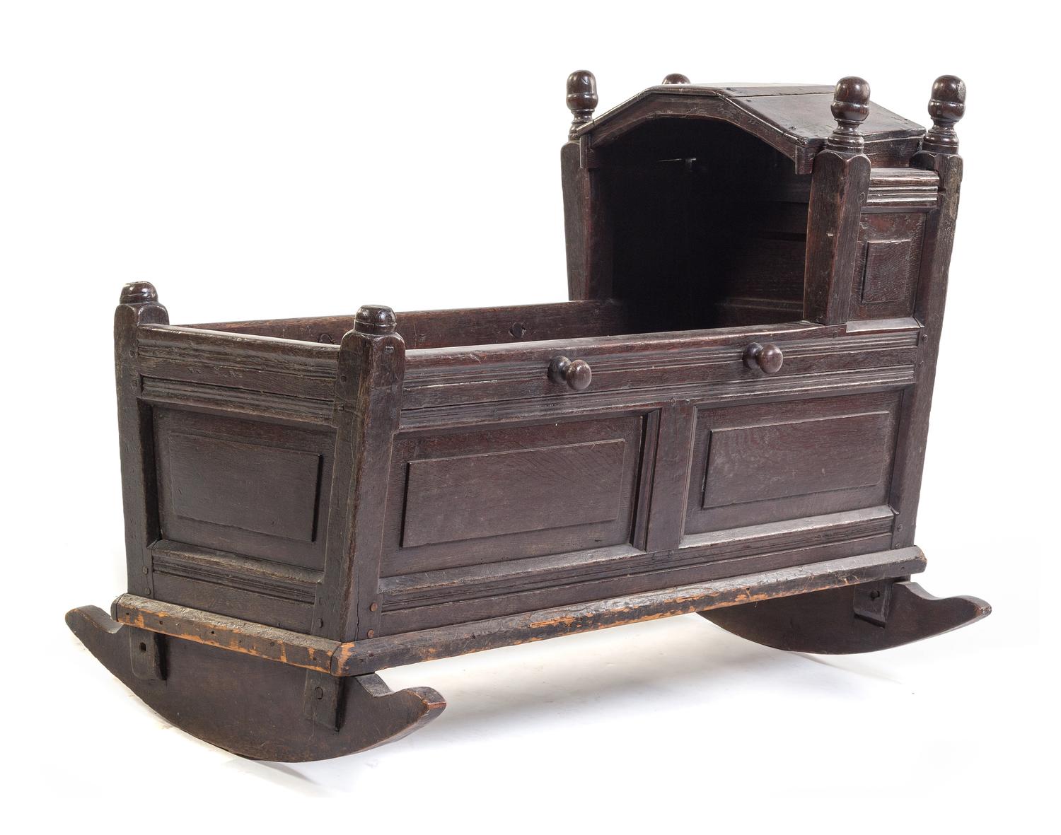 A French Oak Cradle Height 29 x width 38 inches. — 18TH CENTURY