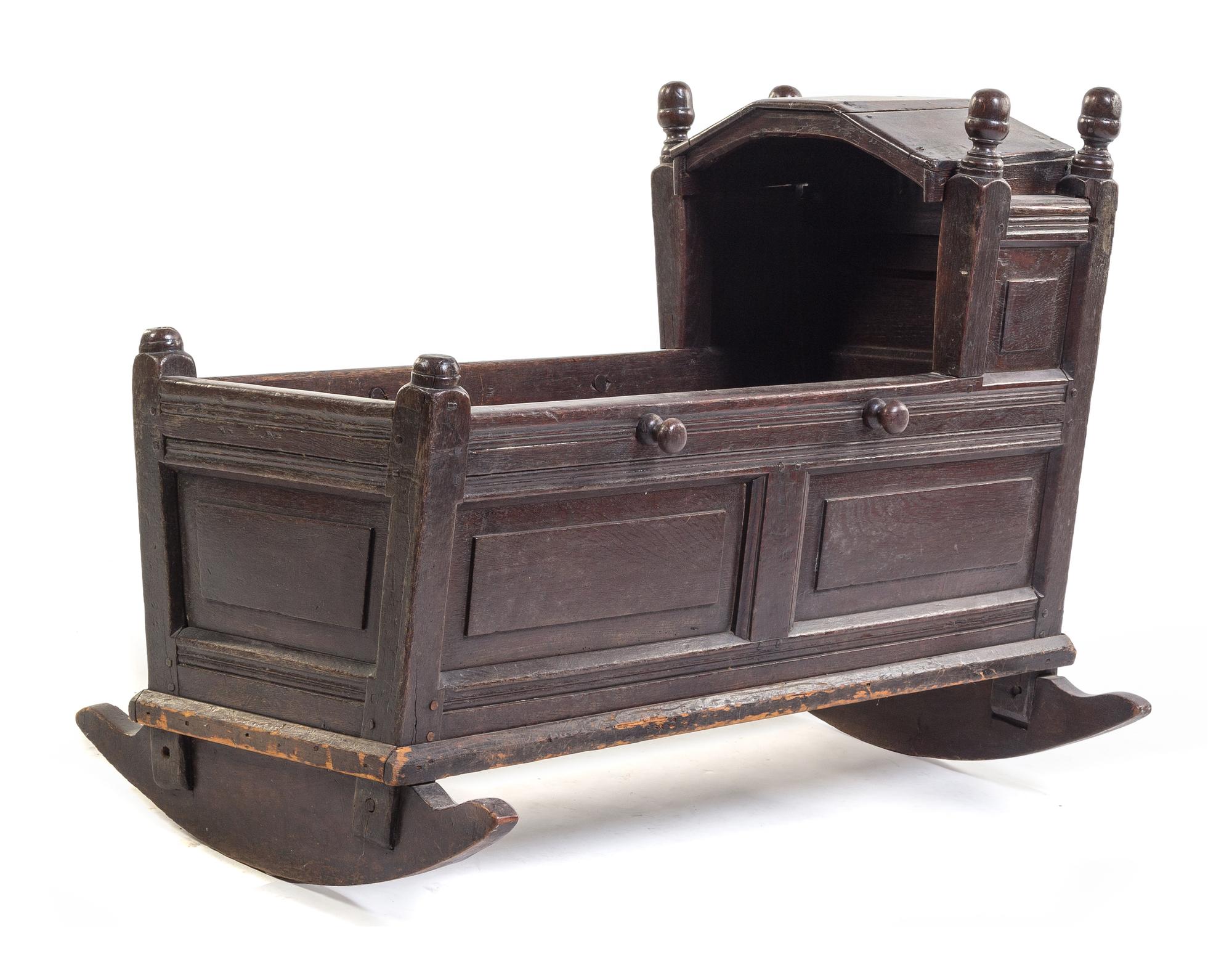 A French Oak Cradle Height 29 x width 38 inches. — 18TH CENTURY