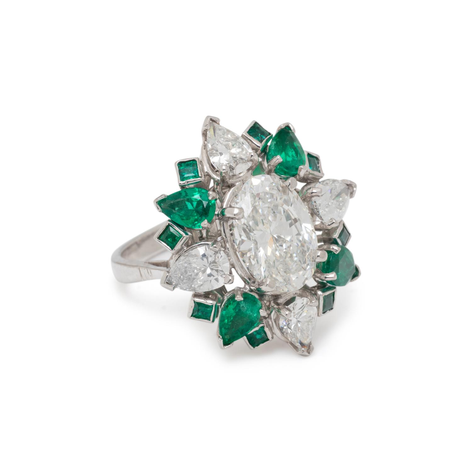 DIAMOND, EMERALD AND PLATINUM RING PENDANT