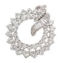 A Platinum and Diamond Pendant/Brooch, 10.75 dwts.