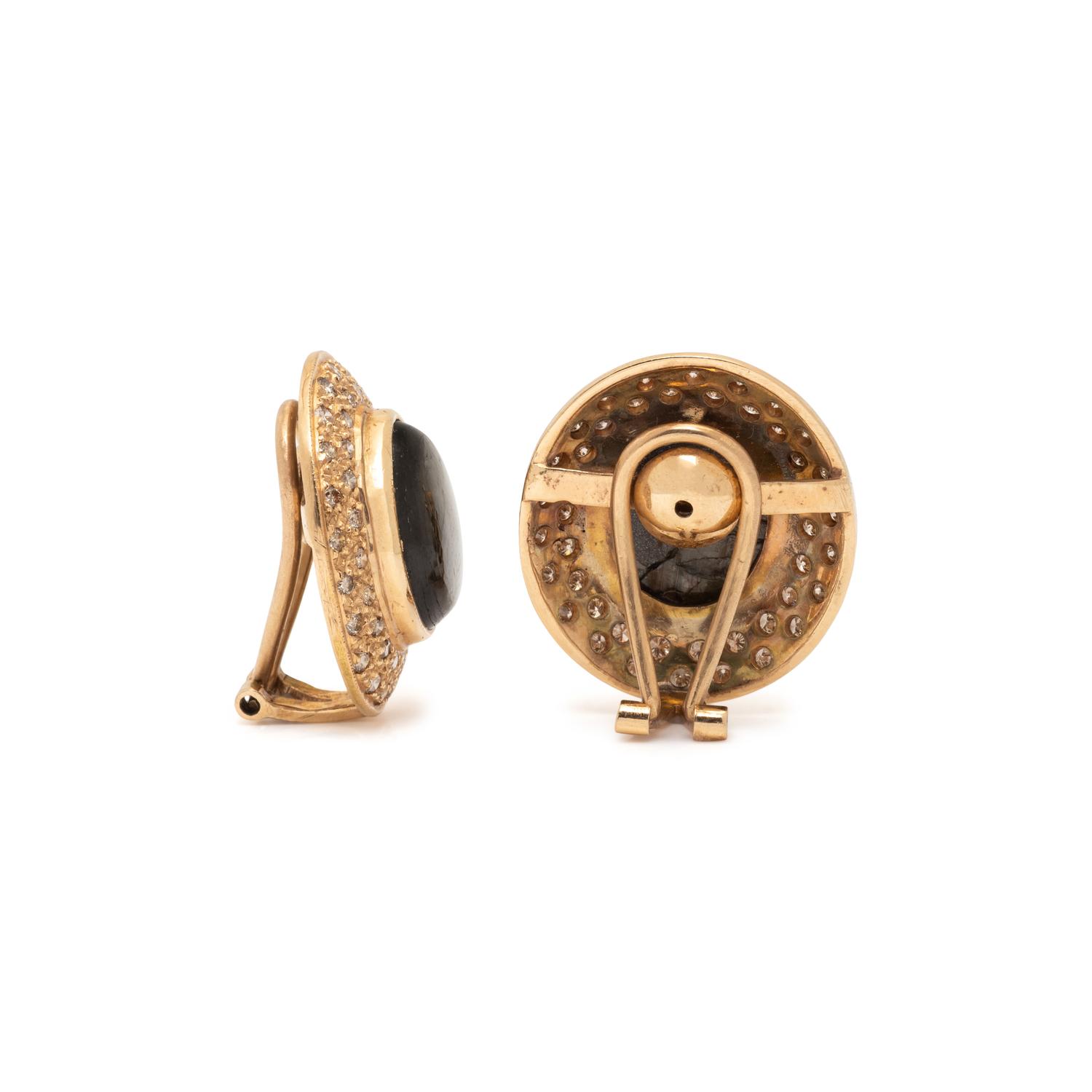 BLACK STAR SAPPHIRE, DIAMOND, AND YELLOW GOLD EARRINGS