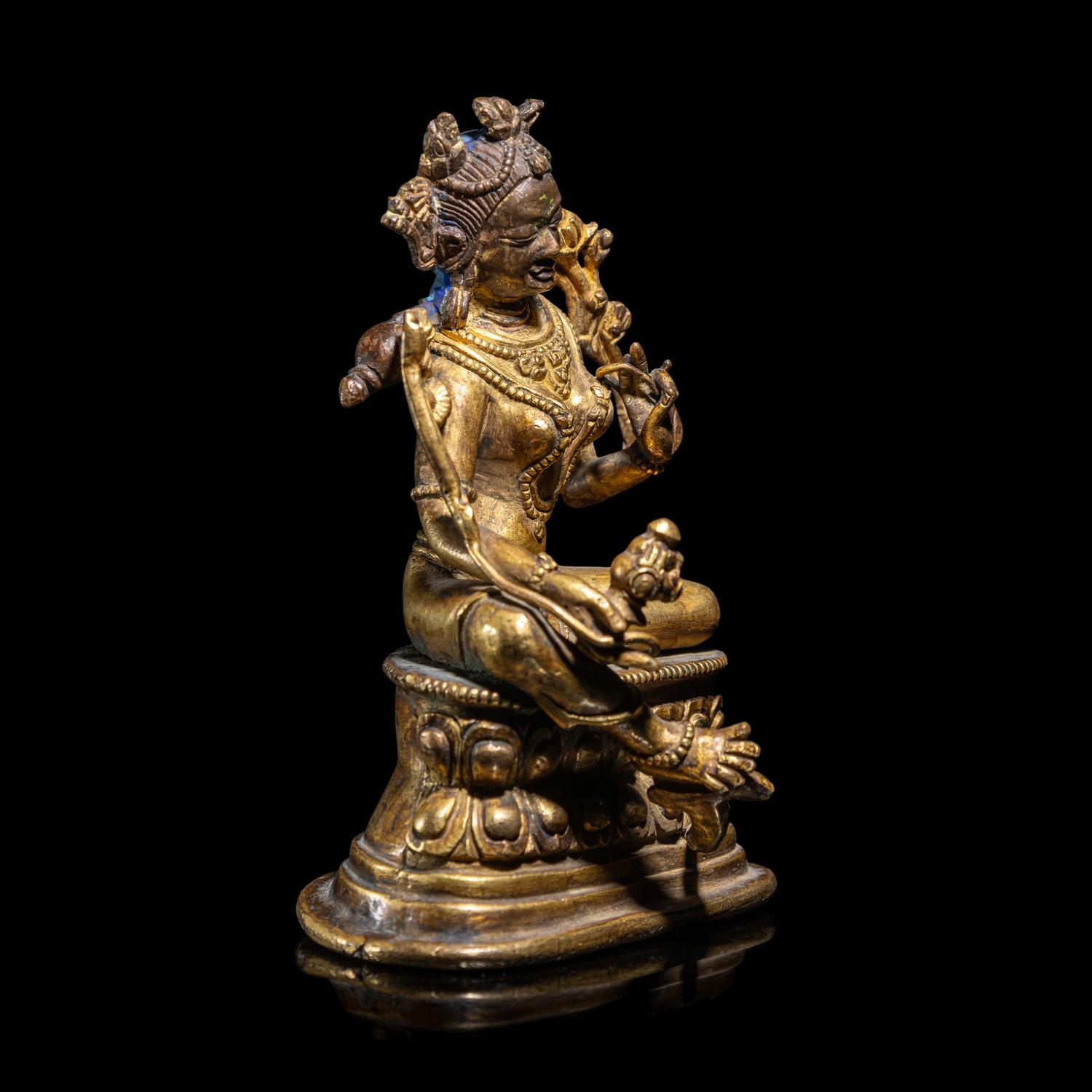 A Gilt Copper Alloy Seated Figure of Tara, in the Style of 11th/12th Century 十一/十二世紀風格 銅鎏金度母