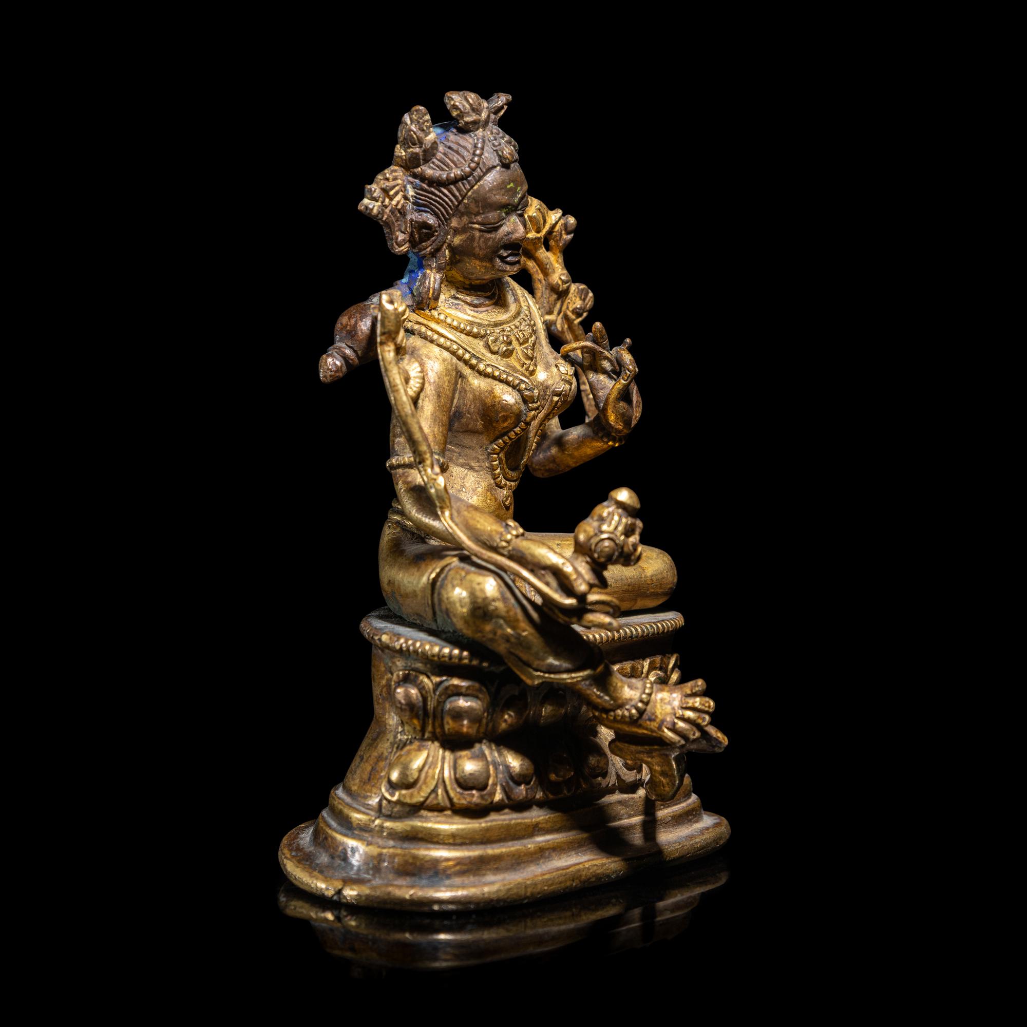 A Gilt Copper Alloy Seated Figure of Tara, in the Style of 11th/12th Century 十一/十二世紀風格 銅鎏金度母