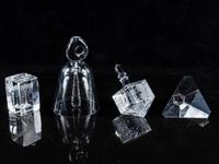 A Group of Four Glass Table Articles