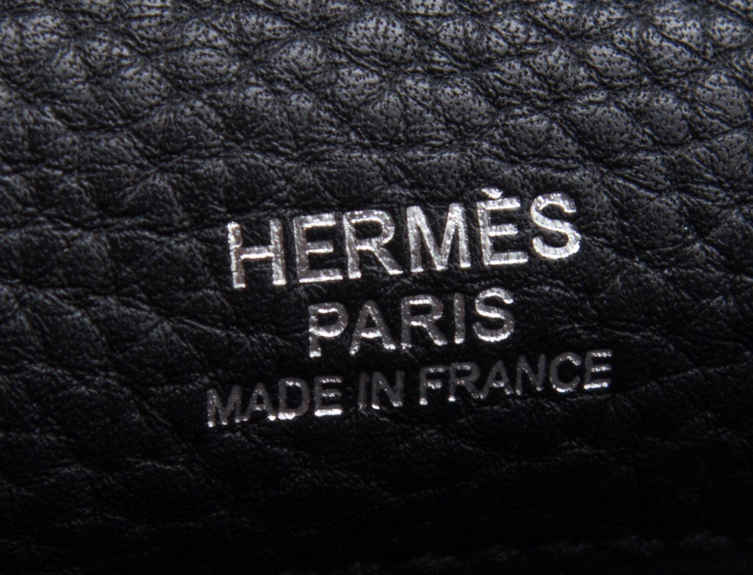 An Hermes Bicolor Noir and Bleu Indigo Swift and Taurillon Clemence 32cm Kelly Ghillies Handbag, 13" x 9.5" x 4.5".