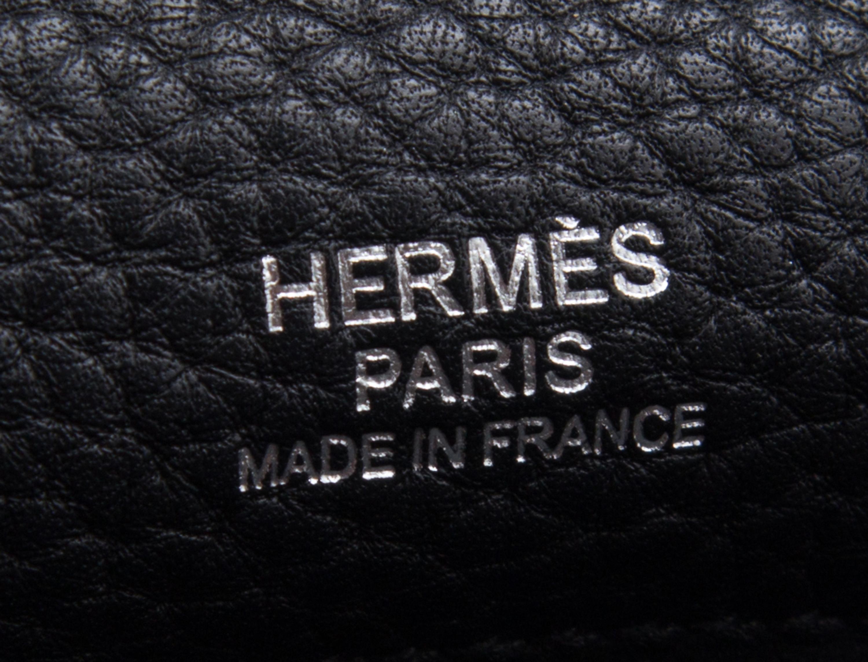 An Hermes Bicolor Noir and Bleu Indigo Swift and Taurillon Clemence 32cm Kelly Ghillies Handbag, 13" x 9.5" x 4.5".