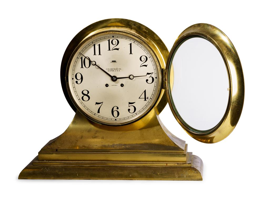 <div><!--block--><strong>A Large Chelsea Ship's Bell Mantel Clock</strong></div>