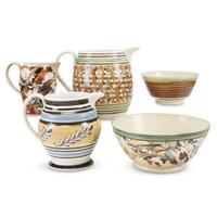 Group of five variously decorated Mochaware pitchers and bowls England, early 19th century