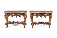 A Pair of Régence Carved Oak Marble-Top Console Tables
